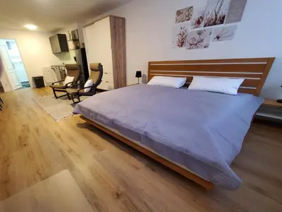 Ein Bett oder Betten in einem Zimmer der Unterkunft Ferienwohnung Blumenstiel