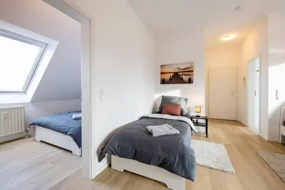 Ein Bett oder Betten in einem Zimmer der Unterkunft SU02 Work & Stay in Groß-Gerau!