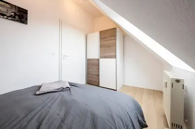 Ein Bett oder Betten in einem Zimmer der Unterkunft SU02 Work & Stay in Groß-Gerau!