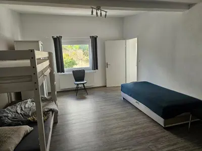 Ein Bett oder Betten in einem Zimmer der Unterkunft Welcome to Ndé-flat in Abstatt
