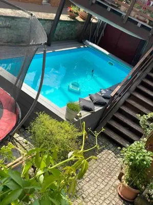 Der Swimmingpool an oder in der Nähe von Einzimmerapartment mit Fass Sauna (und Pool)