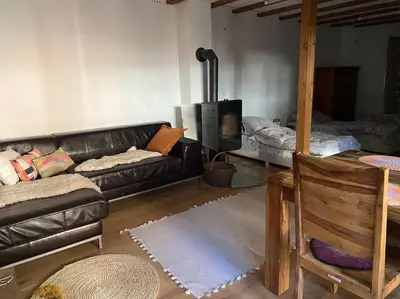 Ein Sitzbereich in der Unterkunft Einzimmerapartment mit Fass Sauna (und Pool)