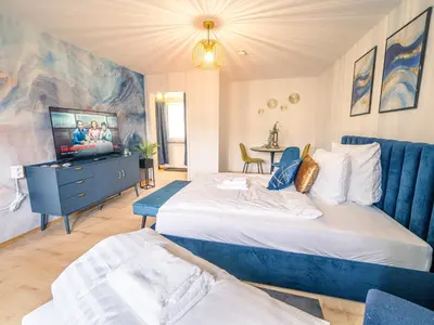 Ein Bett oder Betten in einem Zimmer der Unterkunft City Heart - 2min to station