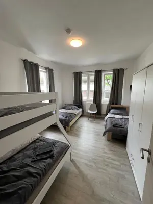 Ein Bett oder Betten in einem Zimmer der Unterkunft City Unterkunft 2