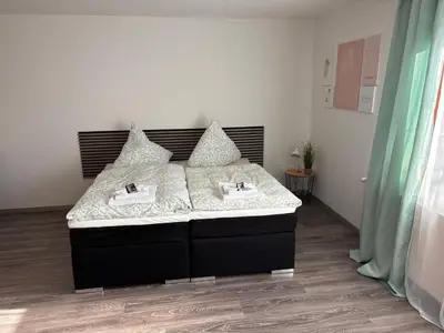 Ein Bett oder Betten in einem Zimmer der Unterkunft Weinberg Lounge