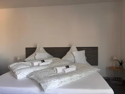 Ein Bett oder Betten in einem Zimmer der Unterkunft Weinberg Lounge