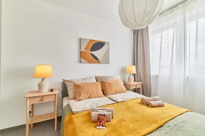 Ein Bett oder Betten in einem Zimmer der Unterkunft Olivia -Einzigartiges Wohnerlebnis in Kaiserslauterns Herz