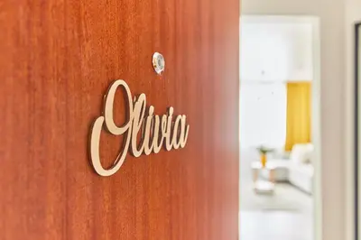 Ein Zertifikat, Auszeichnung, Logo oder anderes Dokument, das in der Unterkunft Olivia -Einzigartiges Wohnerlebnis in Kaiserslauterns Herz ausgestellt ist