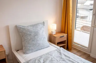 Ein Bett oder Betten in einem Zimmer der Unterkunft bookandstay24 com Münster bei Darmstadt, Frankfurt, Rhein Main Gebiet