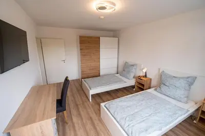 Ein Bett oder Betten in einem Zimmer der Unterkunft bookandstay24 com Münster bei Darmstadt, Frankfurt, Rhein Main Gebiet