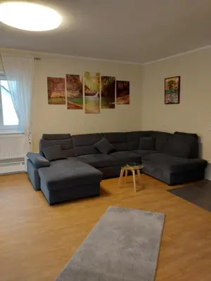 Ein Sitzbereich in der Unterkunft Ferienwohnung Zum Backenzahn