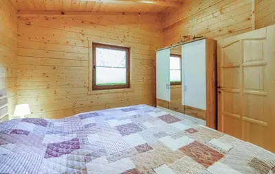 Ein Bett oder Betten in einem Zimmer der Unterkunft Awesome Home In Merzalben With Wi-Fi