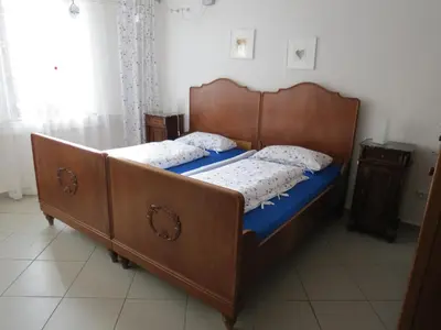 Ein Bett oder Betten in einem Zimmer der Unterkunft Im Alten Kaufhaus