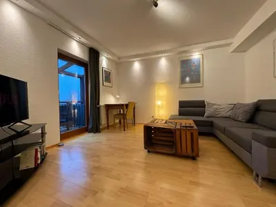 Ein Sitzbereich in der Unterkunft Gemütliche 2-Zimmer-Wohnung by Rabe - Innenhof, Smart-TV, Netflix