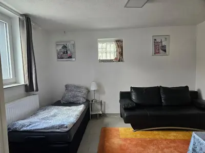 Ein Sitzbereich in der Unterkunft Flat Bangoua