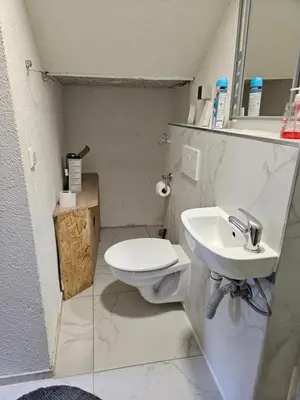 Ein Badezimmer in der Unterkunft Flat Bangoua