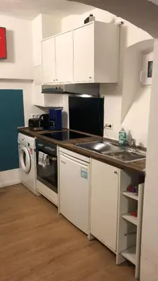 Küche/Küchenzeile in der Unterkunft 1-Zimmer Gartenwohnung in Speyer