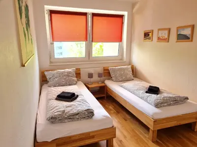 Ein Bett oder Betten in einem Zimmer der Unterkunft Monteurwohnung, zentral, voll ausgestattet in Uninähe