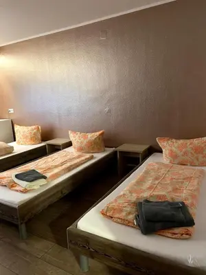 Ein Bett oder Betten in einem Zimmer der Unterkunft Bew Monteurzimmer - Karlsbad