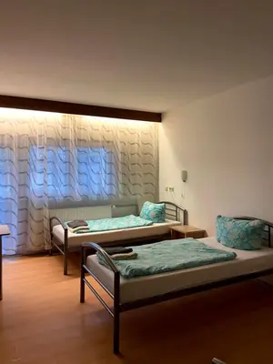 Ein Bett oder Betten in einem Zimmer der Unterkunft Bew Monteurzimmer - Karlsbad