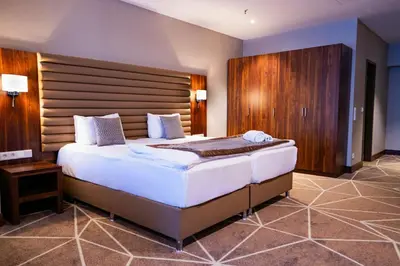 Ein Bett oder Betten in einem Zimmer der Unterkunft Puzzle Hotel Airport Frankfurt