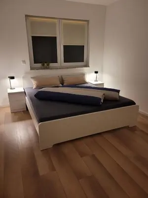Ein Bett oder Betten in einem Zimmer der Unterkunft Ferienwohnung Vara