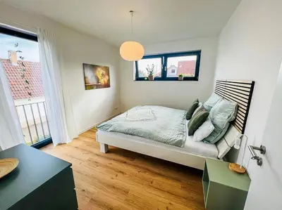 Ein Bett oder Betten in einem Zimmer der Unterkunft Vyne Apartments - Terrasse - Grill - Privatparkplatz