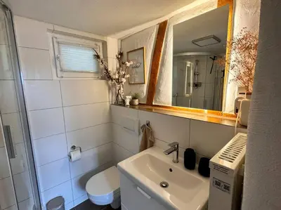 Ein Badezimmer in der Unterkunft Pfälzer Hexenhäuschen in Edesheim