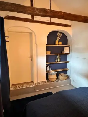 Ein Bett oder Betten in einem Zimmer der Unterkunft Pfälzer Hexenhäuschen in Edesheim