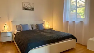 Ein Bett oder Betten in einem Zimmer der Unterkunft Ferienwohnung Panoramablick