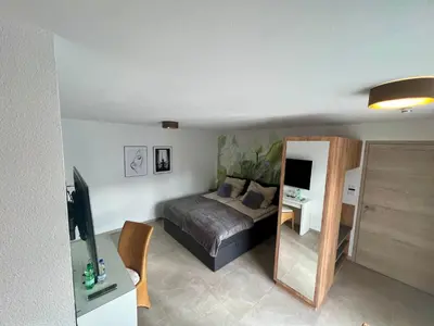 Ein Bett oder Betten in einem Zimmer der Unterkunft Ferienwohnung im Odenwald