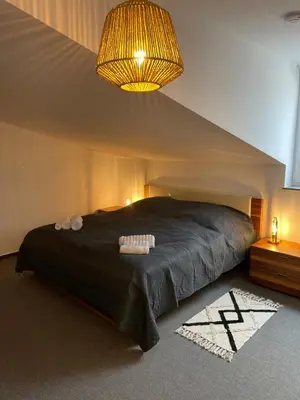 Ein Bett oder Betten in einem Zimmer der Unterkunft Stilvolle Maisonette
