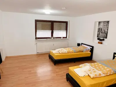 Ein Bett oder Betten in einem Zimmer der Unterkunft Herrenalber