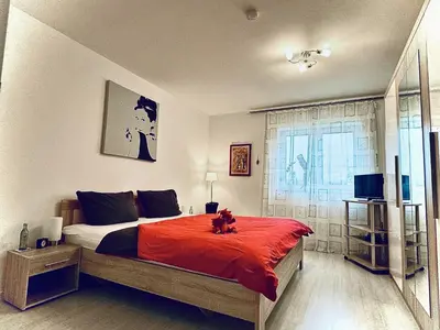 Ein Bett oder Betten in einem Zimmer der Unterkunft Ferienwohnung Drachenhaus WIR holen Sie aus dem Alltag raus
