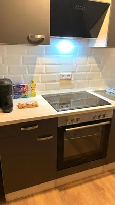 Küche/Küchenzeile in der Unterkunft City Appartement direkt am Schloss!
