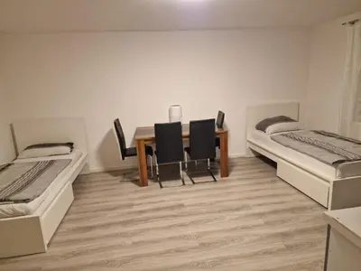 Ein Bett oder Betten in einem Zimmer der Unterkunft Ferienwohnung Sumi