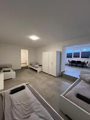 Ein Bett oder Betten in einem Zimmer der Unterkunft Mieterlux Frankfurt Heusenstamm