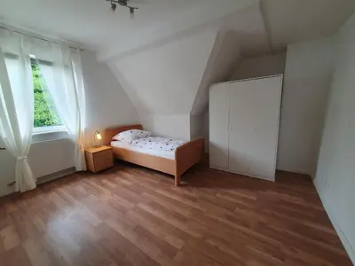 Ein Bett oder Betten in einem Zimmer der Unterkunft Privatzimmer direkt an der Uniklinik Mainz