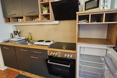 Küche/Küchenzeile in der Unterkunft Renoviertes Gartenapartment