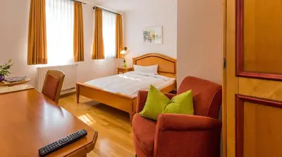 Ein Bett oder Betten in einem Zimmer der Unterkunft Boutique- und Businesshotel Herrenküferei