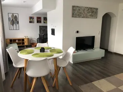 Ein Sitzbereich in der Unterkunft Einliegerwohnung in Gissigheim