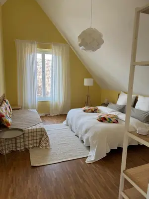 Ein Bett oder Betten in einem Zimmer der Unterkunft Wohnen am Seebach II
