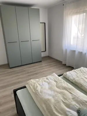 Ein Bett oder Betten in einem Zimmer der Unterkunft Am Kienbusch - Südliche Weinstraße - Erdgeschoss