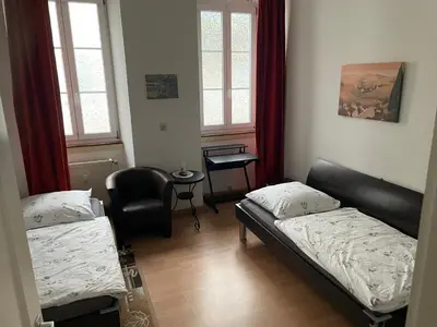 Ein Bett oder Betten in einem Zimmer der Unterkunft Holländers Apartment