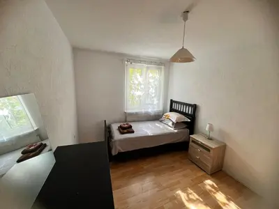 Ein Bett oder Betten in einem Zimmer der Unterkunft Jennis Bi-Bi 2 bedrooms Apartment