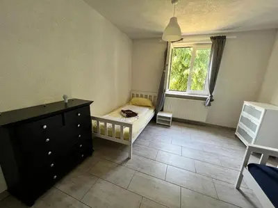 Ein Bett oder Betten in einem Zimmer der Unterkunft Jennis Bi-Bi 2 bedrooms Apartment