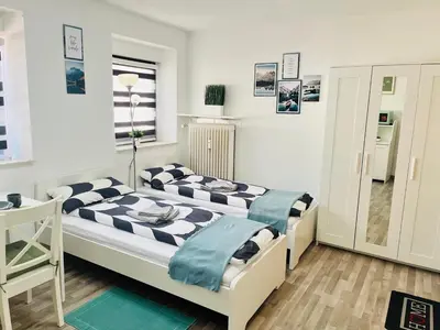 Ein Bett oder Betten in einem Zimmer der Unterkunft LENASTAY I Nette Unterkunft I Günstige Lage