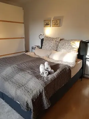 Ein Bett oder Betten in einem Zimmer der Unterkunft Ferienwohnung 'dasBRENNERs'