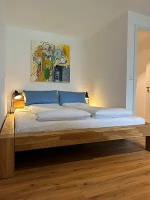 Ein Bett oder Betten in einem Zimmer der Unterkunft City Apartment mit TG Stellplatz Duplex oben - Glücks-Quartier Urban 01