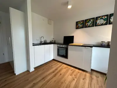 Küche/Küchenzeile in der Unterkunft City Apartment mit TG Stellplatz Duplex oben - Glücks-Quartier Urban 01